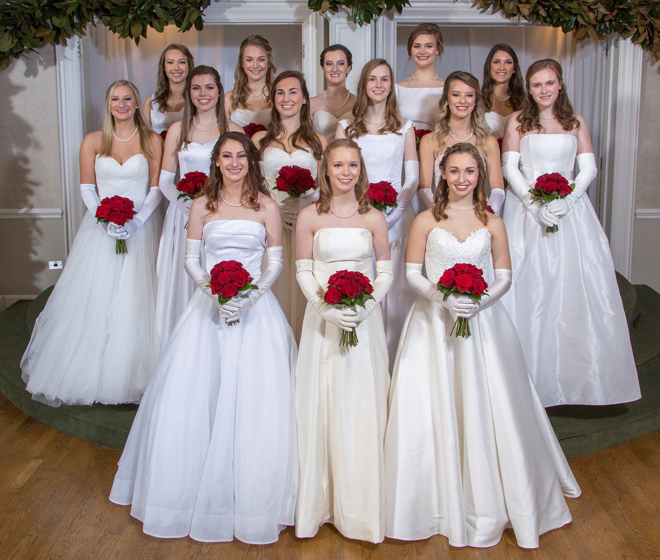 Photo of the models wearing bridal gowns